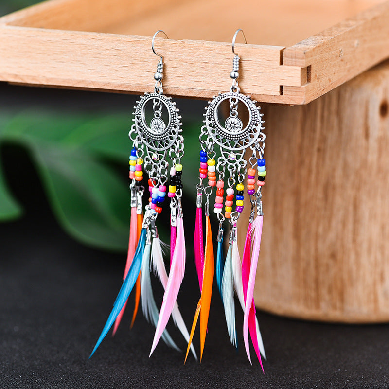 Wholesale Alloy Hollow Long Feather Earrings